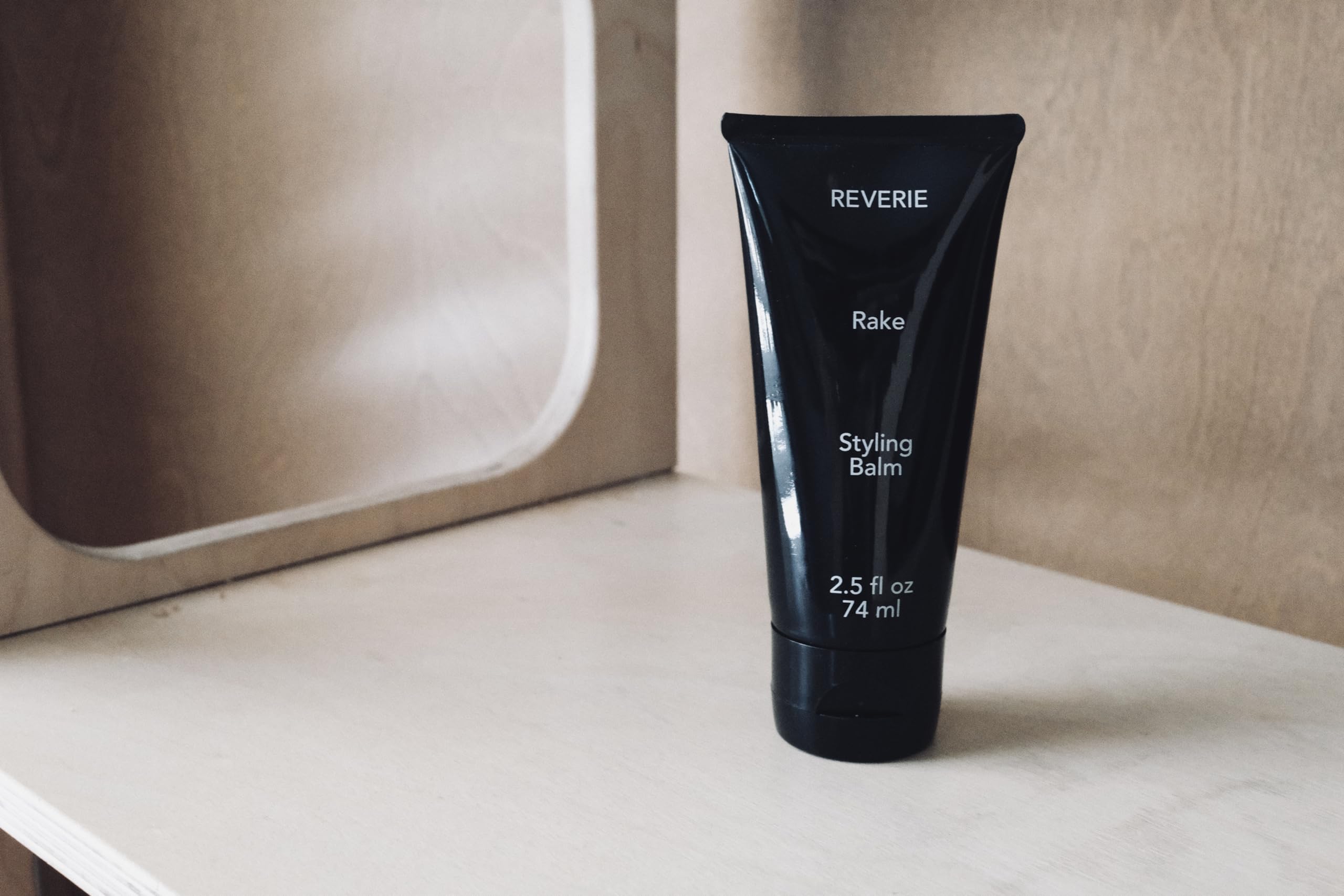 REVERIE full-size 2.5 oz bottle offers lasting lightweight hold and curl maintenance.