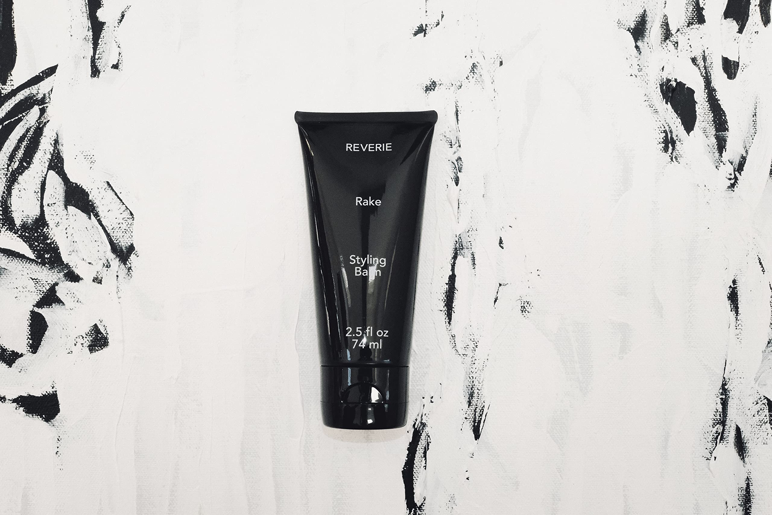 REVERIE mango nut butter infusion nourishes hair while adding slip for easy styling.