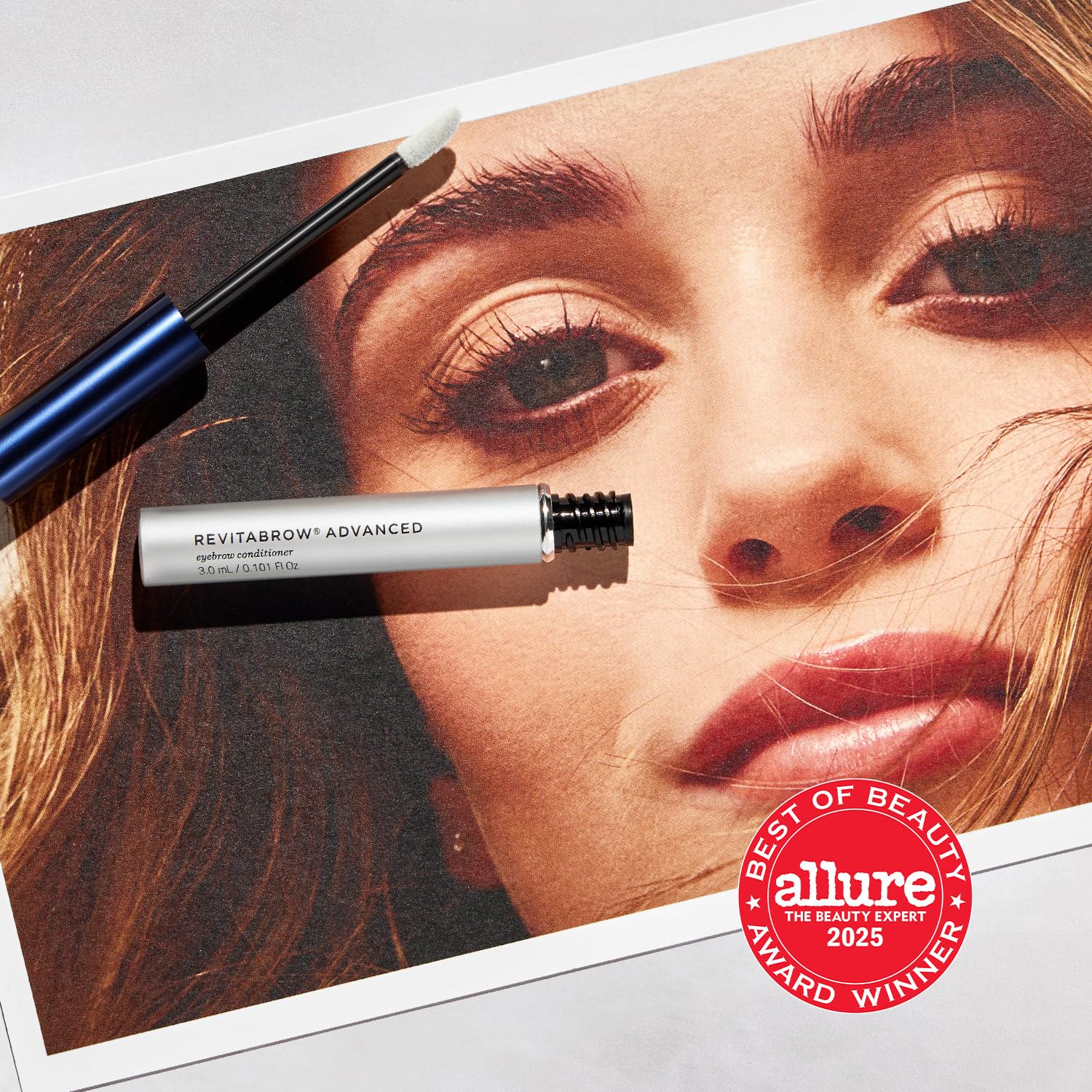 RevitaLash RevitaBrow model applying serum to brows, illustrates everyday beauty routine