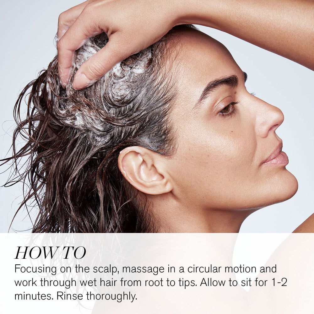 RevitaLash shampoo lather on hand demonstrating gentle scalp cleansing benefit