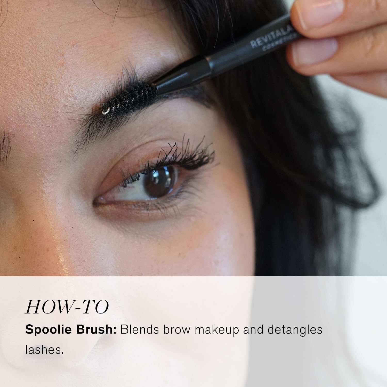 RevitaLash spoolie used on brows in a lifestyle setting for precise shaping and natural finish