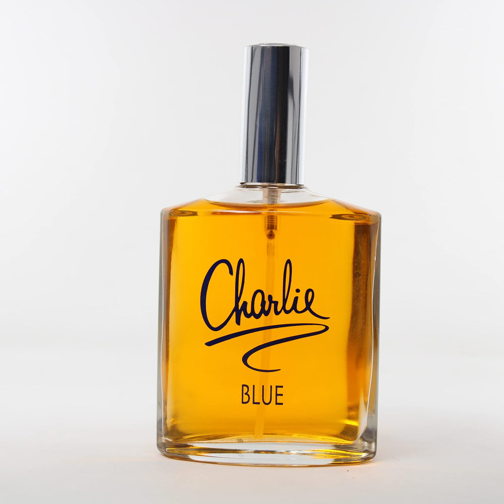 REVLON Charlie Blue Natural Spray user applying spray for daily fragrance touch