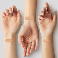 Revlon hyaluronic-acid moisture boost shown in foundation texture close-up.