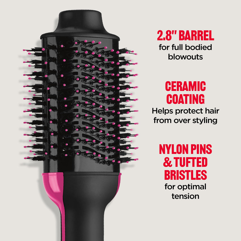 REVLON held in hand to show scale and larger barrel ideal for long hair