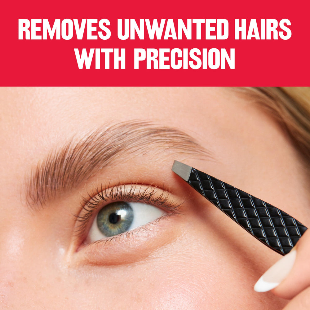 Revlon slant tweezer gripping a fine hair showing accurate removal benefit