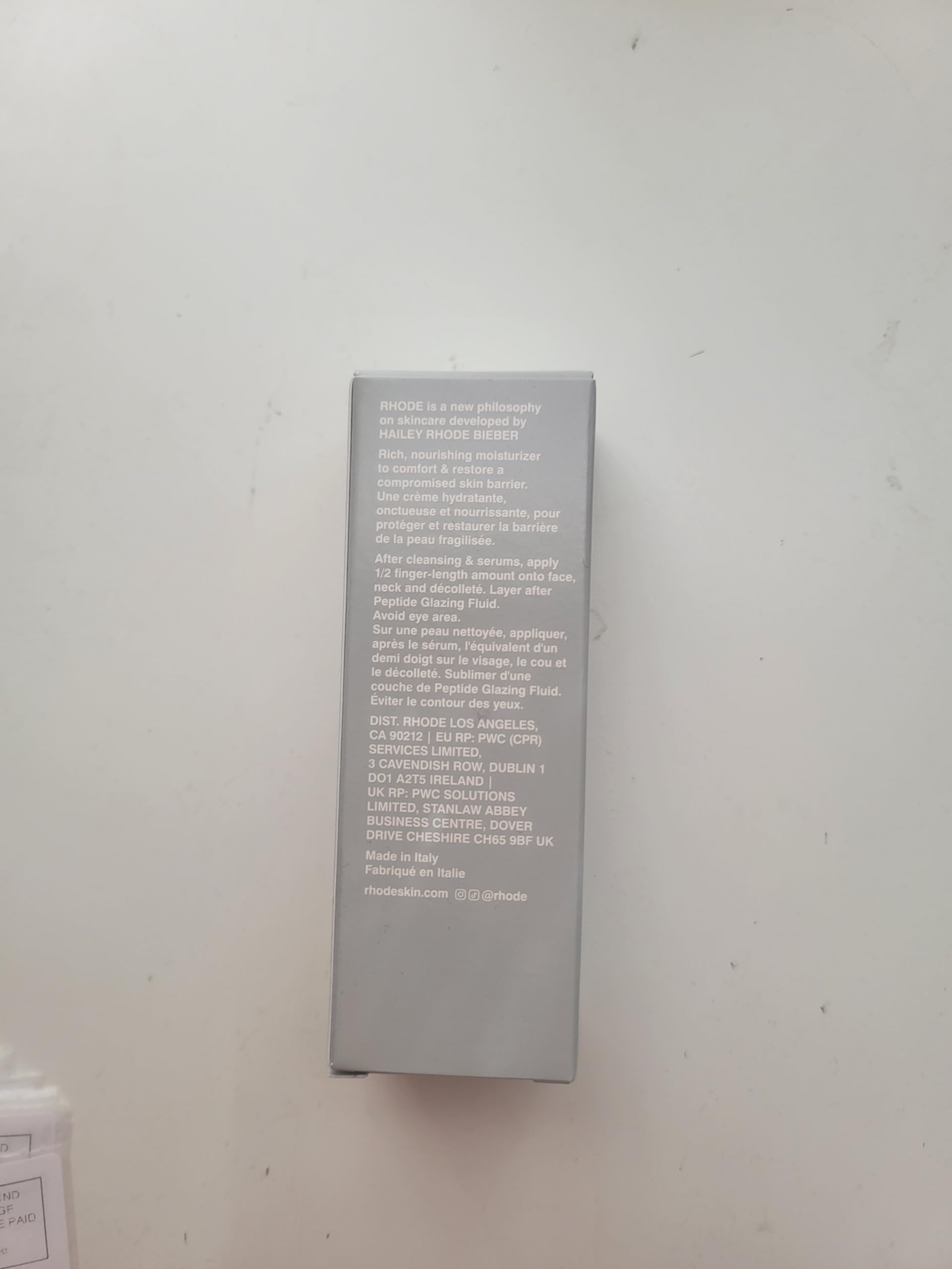 Rhode Barrier Restore Cream texture appears lightweight and fast-absorbing.
