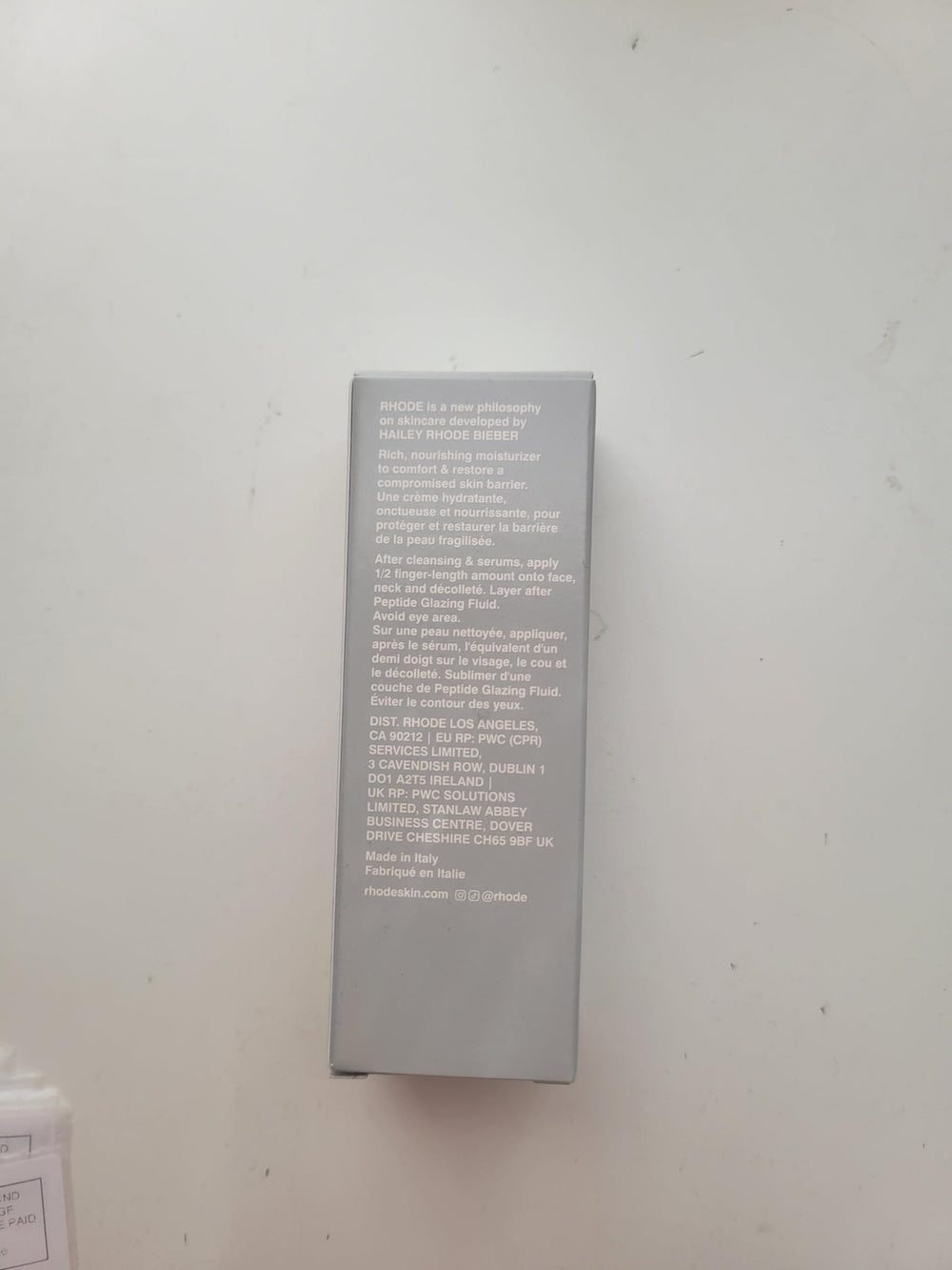Rhode Barrier Restore Cream texture appears lightweight and fast-absorbing.