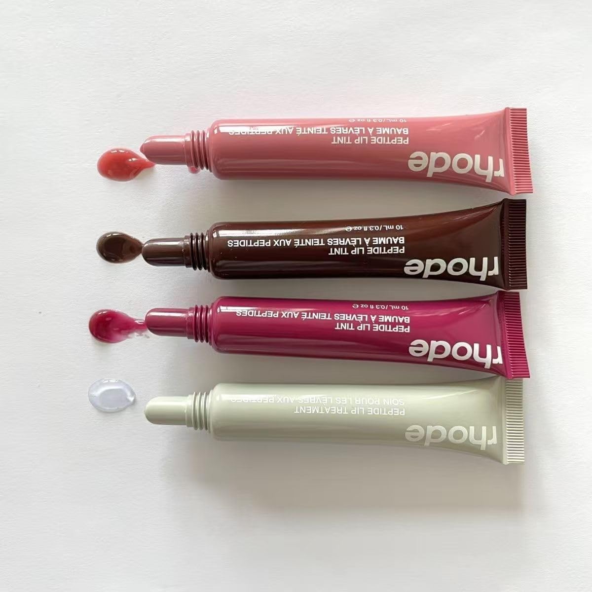 Rhode Gloss Lip Tint Toast lifestyle shot demonstrates everyday wear with a glossy finish.