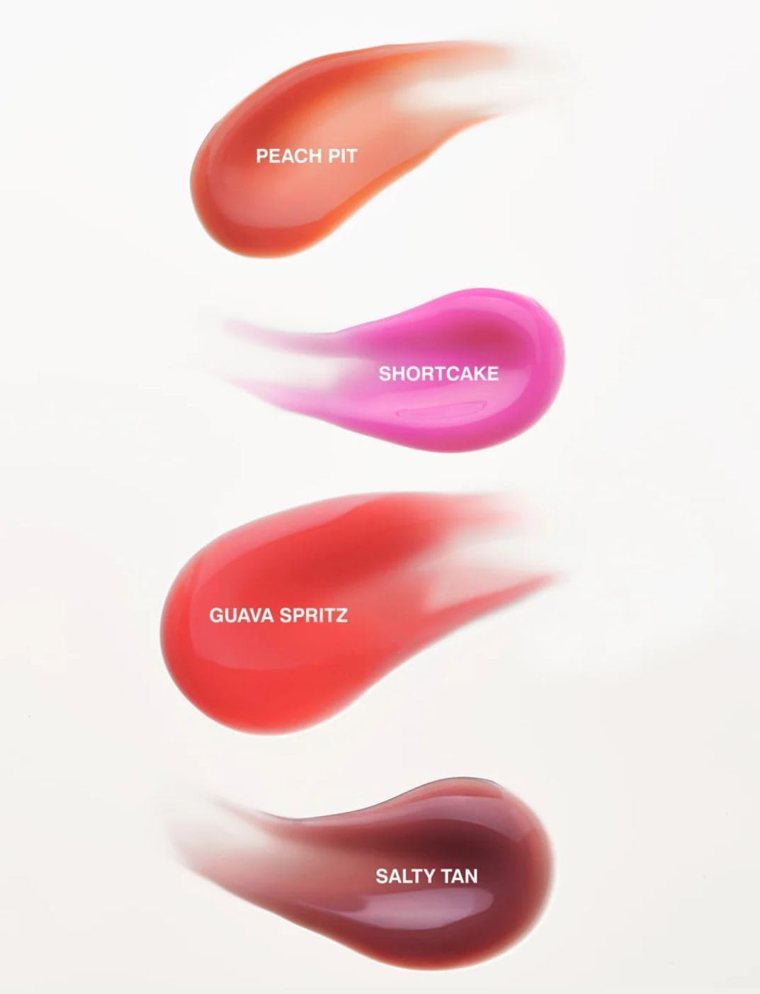 Rhode Gloss Lip Tint Toast close-up highlights minimal, clean packaging for daily use.