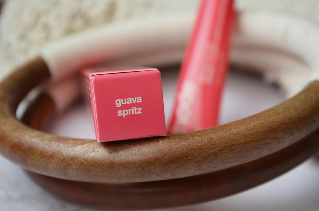 Rhode Guava Spritz glossy finish close-up highlights hydrating shine