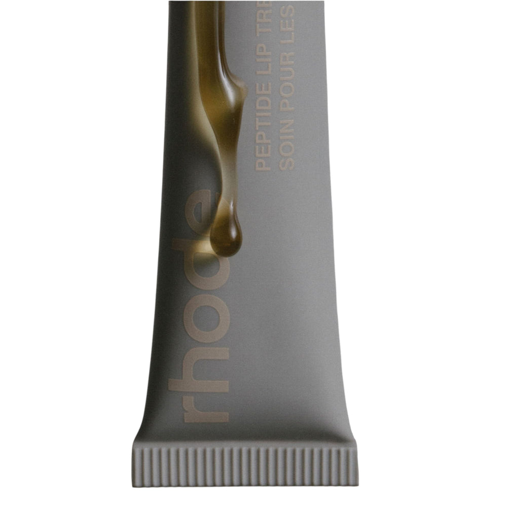 Rhode Hailey Bieber peptide lip treatment application shows silky, nourished lips.