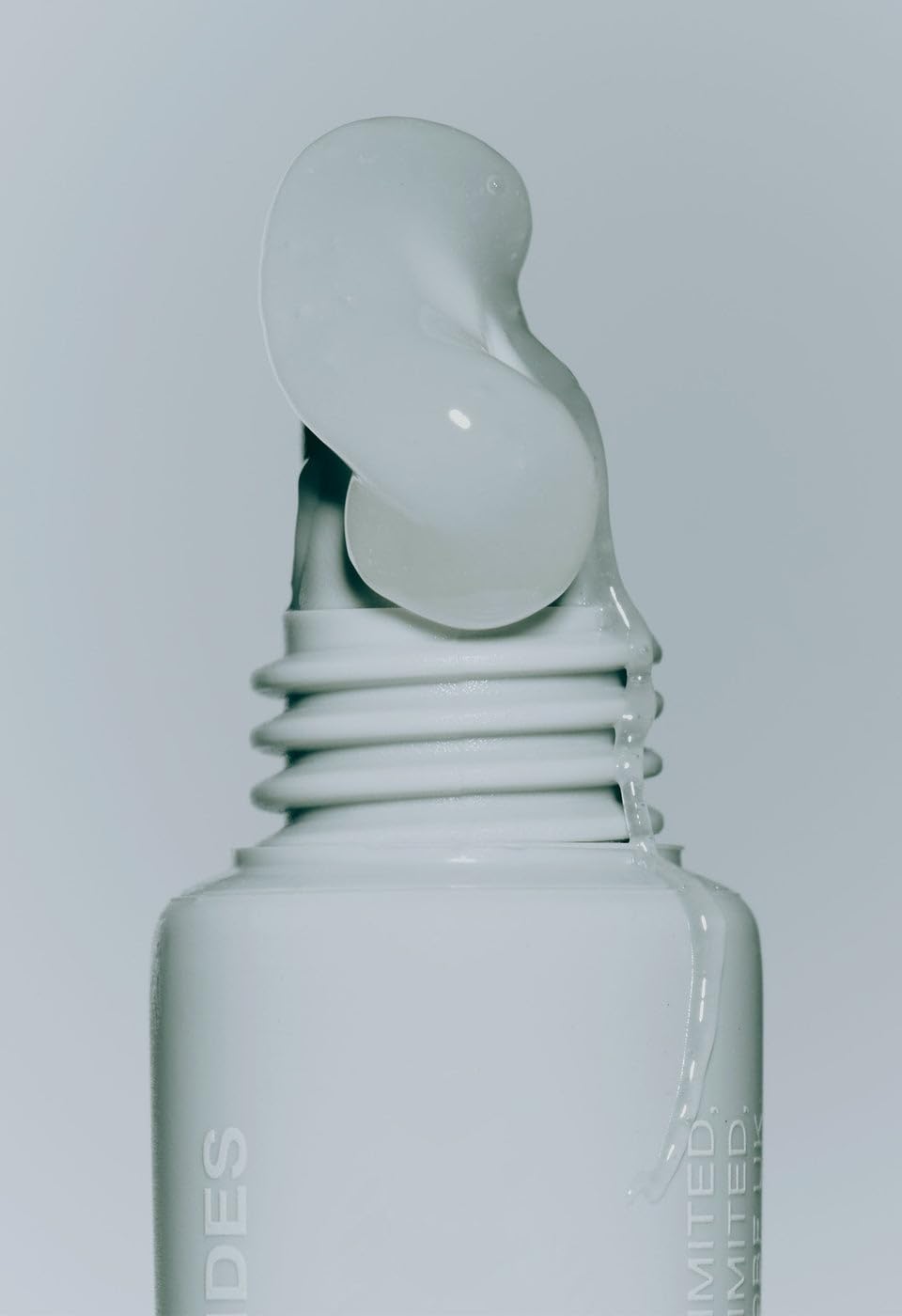 Rhode lip care closeup shows glossy, pillow-soft lips.