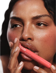 Rhode Peach Pit hydration boost image suggesting moisturized lips.