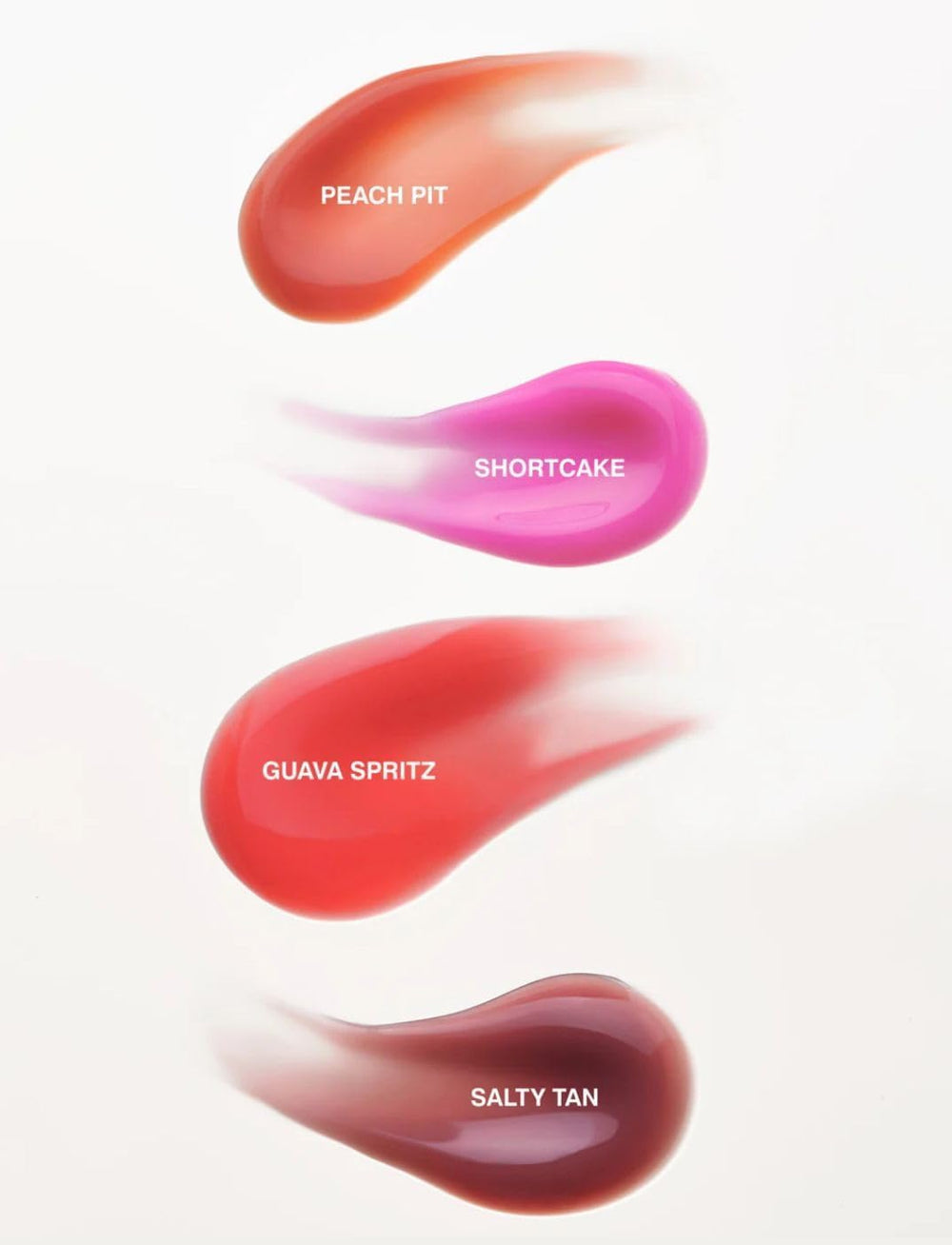 Rhode Peach Pit lip tint showing natural sheen for day-to-night looks.