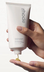 Rhode Pineapple Refresh Daily Cleanser after rinse leaves clean, soft skin with radiance.
