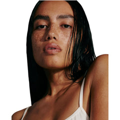 Rhode salted-carmel lip treatment glossy lips closeup highlights moisture and shine.