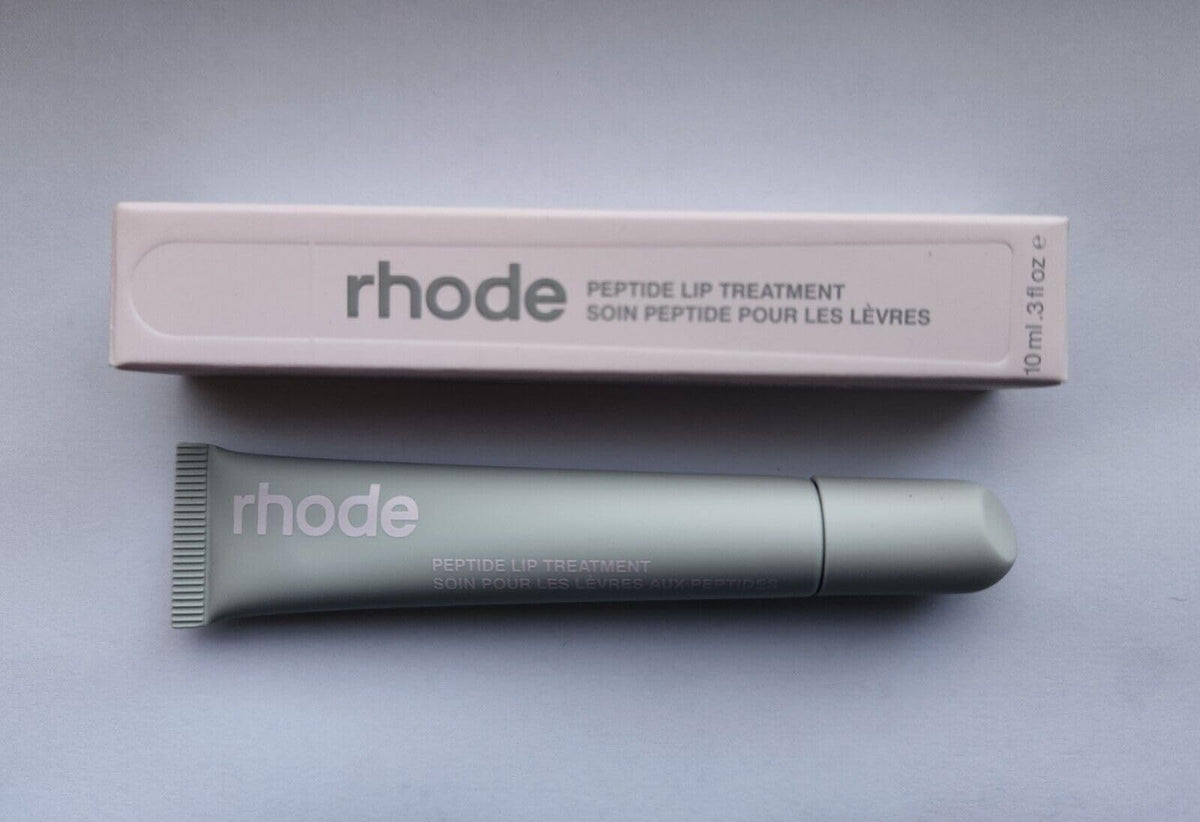 Rhode Watermelon Slice Lip Treatment tube delivering nourishing hydration for soft, glossy lips.