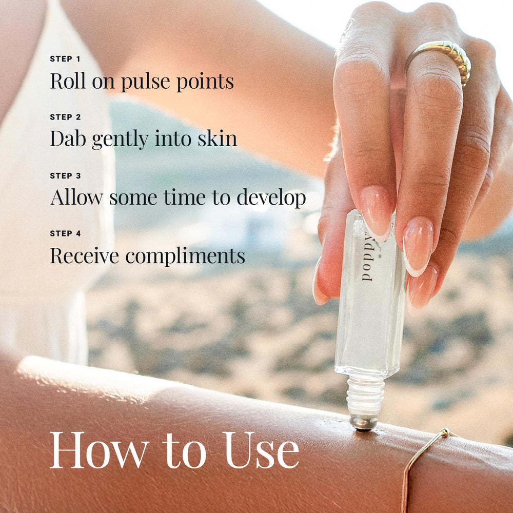 Riddle Oil Poppy roll-on on the wrist demonstrates quick absorption for on-the-go fragrance