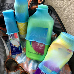 Rinseroo LeakLocks elastic sleeve used during travel to guard toiletries against leaks