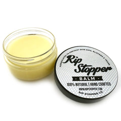 Rip Stopper Balm packaging highlighting 100% natural ingredients for skin care