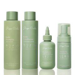 Rizos Curls complete lengthening oil bottle demonstrates longer, fuller hair potential.