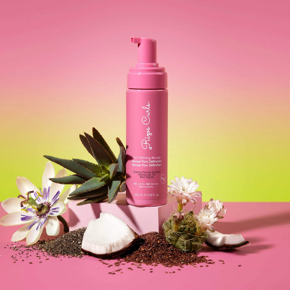Rizos Curls Curl Defining Mousse in-hand texture emphasizes lightweight styling