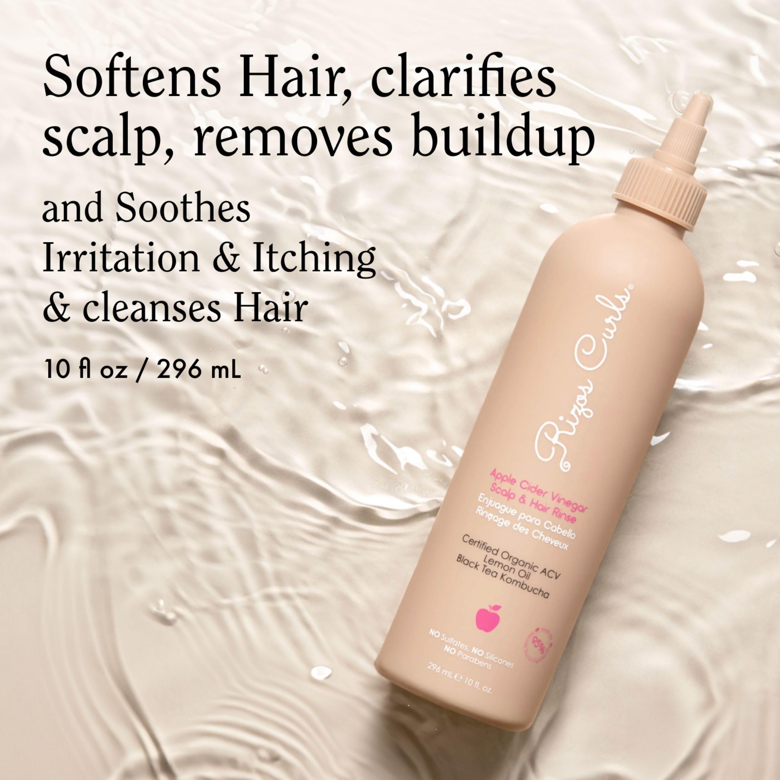 Rizos Curls pour close-up showing clear rinse texture and easy application