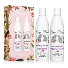 Rizos Curls Hydrating Shampoo bottle pour offers gentle cleansing for all curl textures.