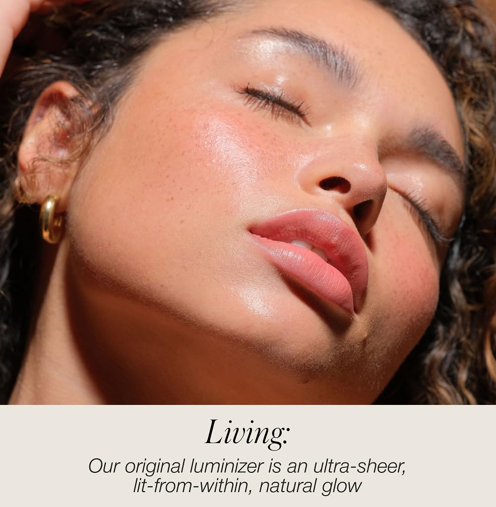 RMS Beauty Luminizer application brush demonstrates precise glow application.