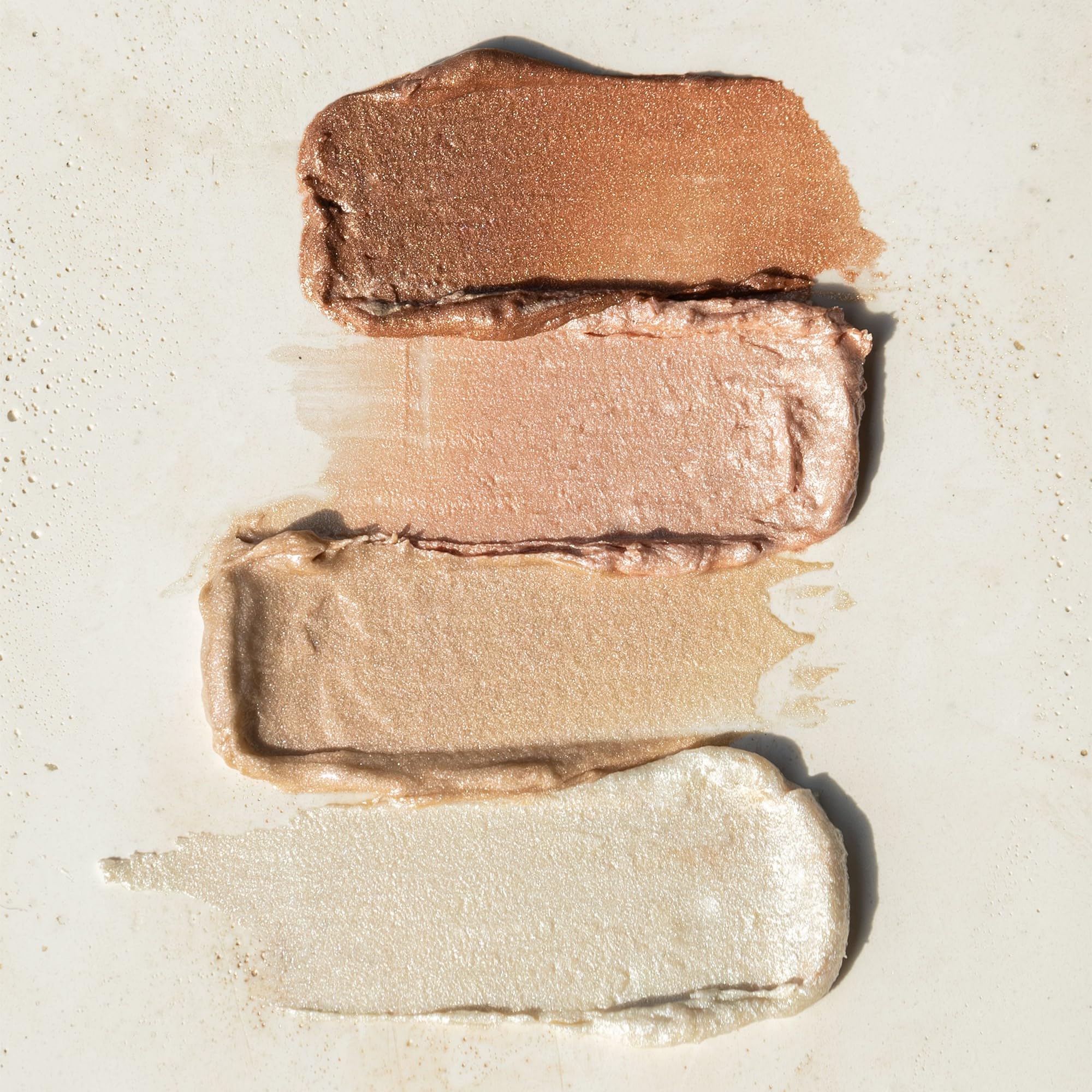 RMS Beauty Luminizer compact swatch shows weightless glow.