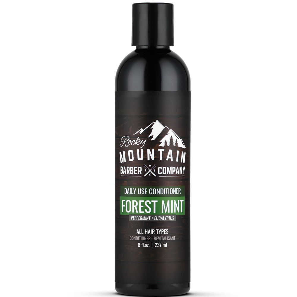Rocky Mountain Barber Company conditioner bottle pour highlights refreshing tea tree infusion for hydrated hair.