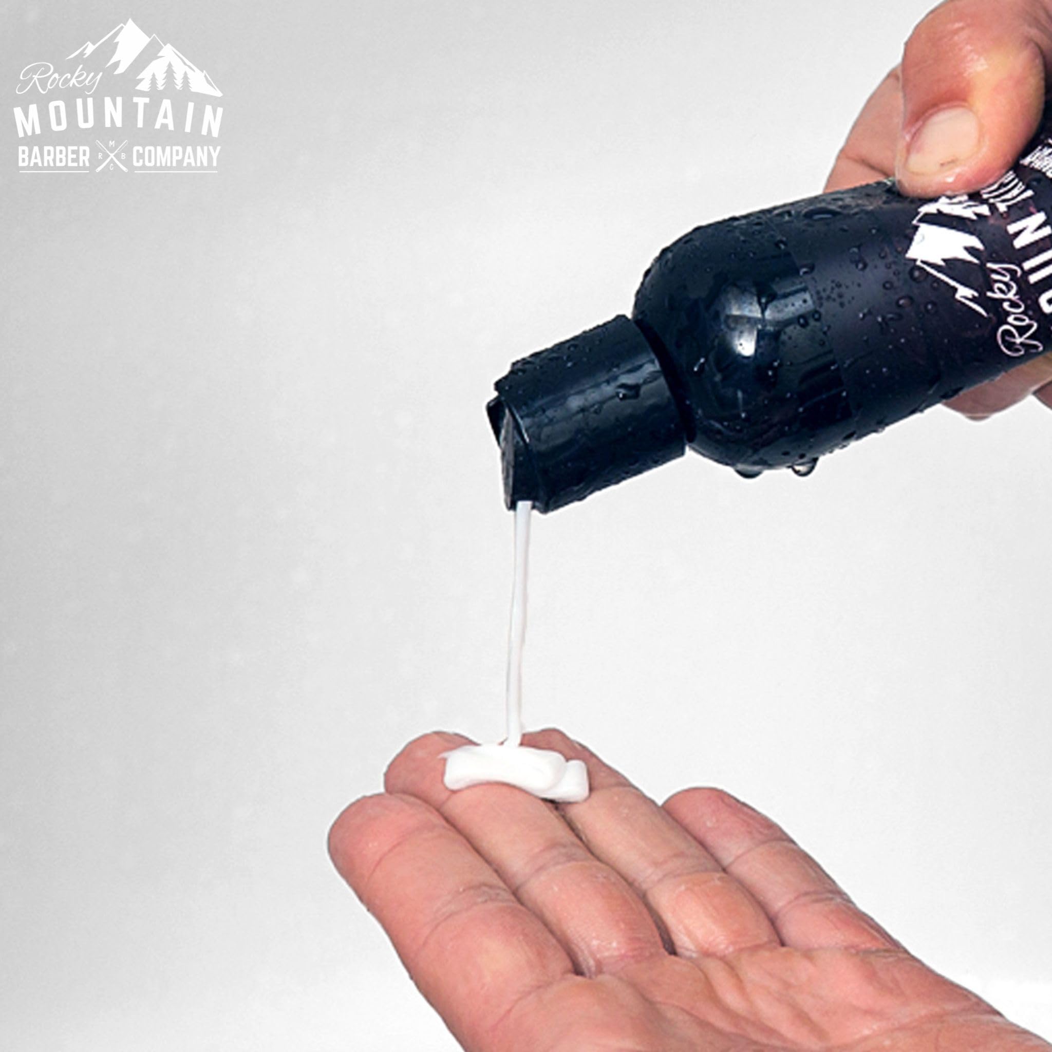 Rocky Mountain Barber Company conditioner on sink suggests daily grooming routine.