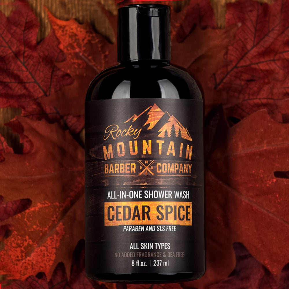 Rocky Mountain Cedar Spice 8oz-bottle foreground highlights compact travel-friendly packaging.