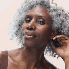 Rodan + Fields redefine intensive renewing serum label closeup highlights retinol night serum for refreshed-looking skin.