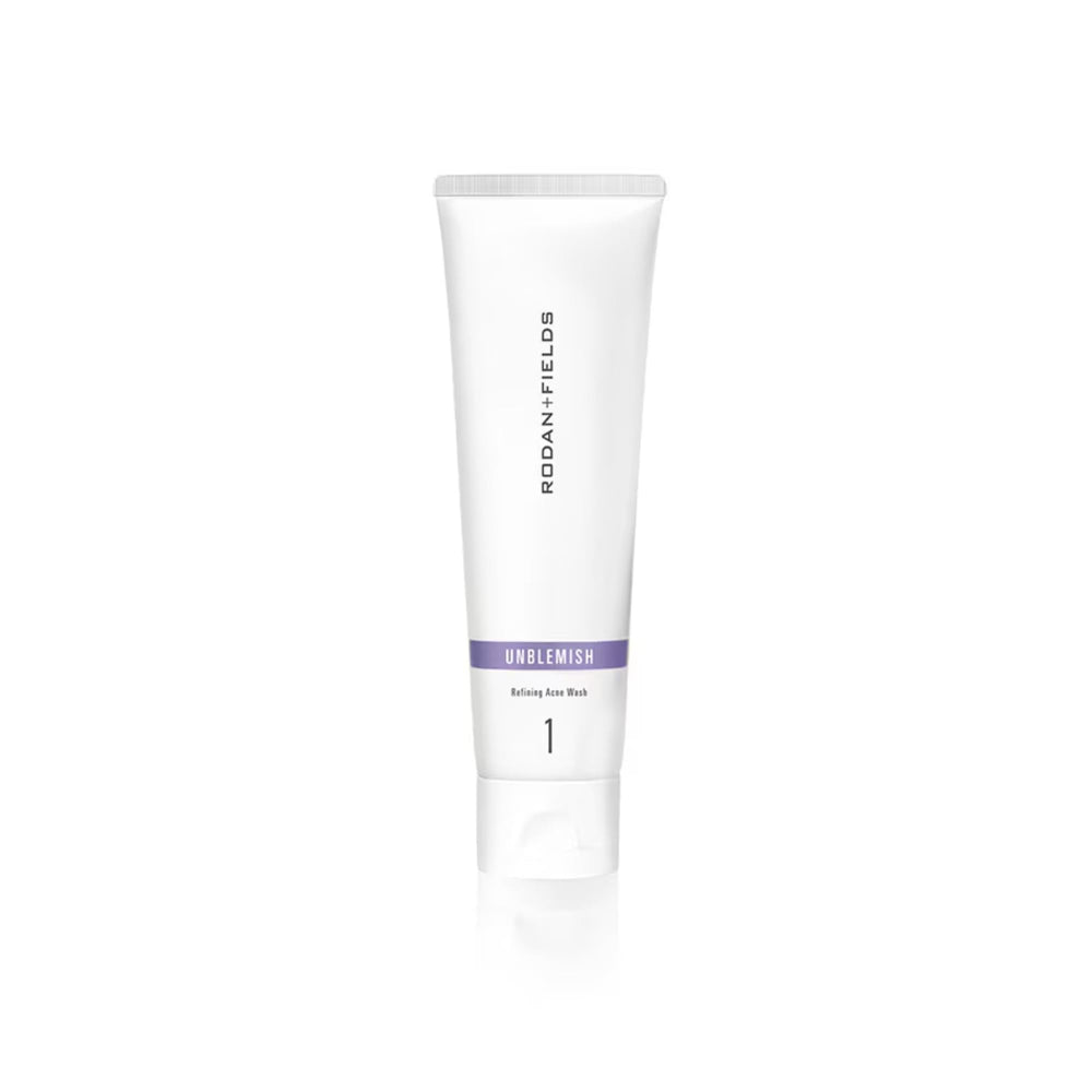 Rodan + Fields Unblemish Face Wash bottle pour showing oil control and gentle cleansing.