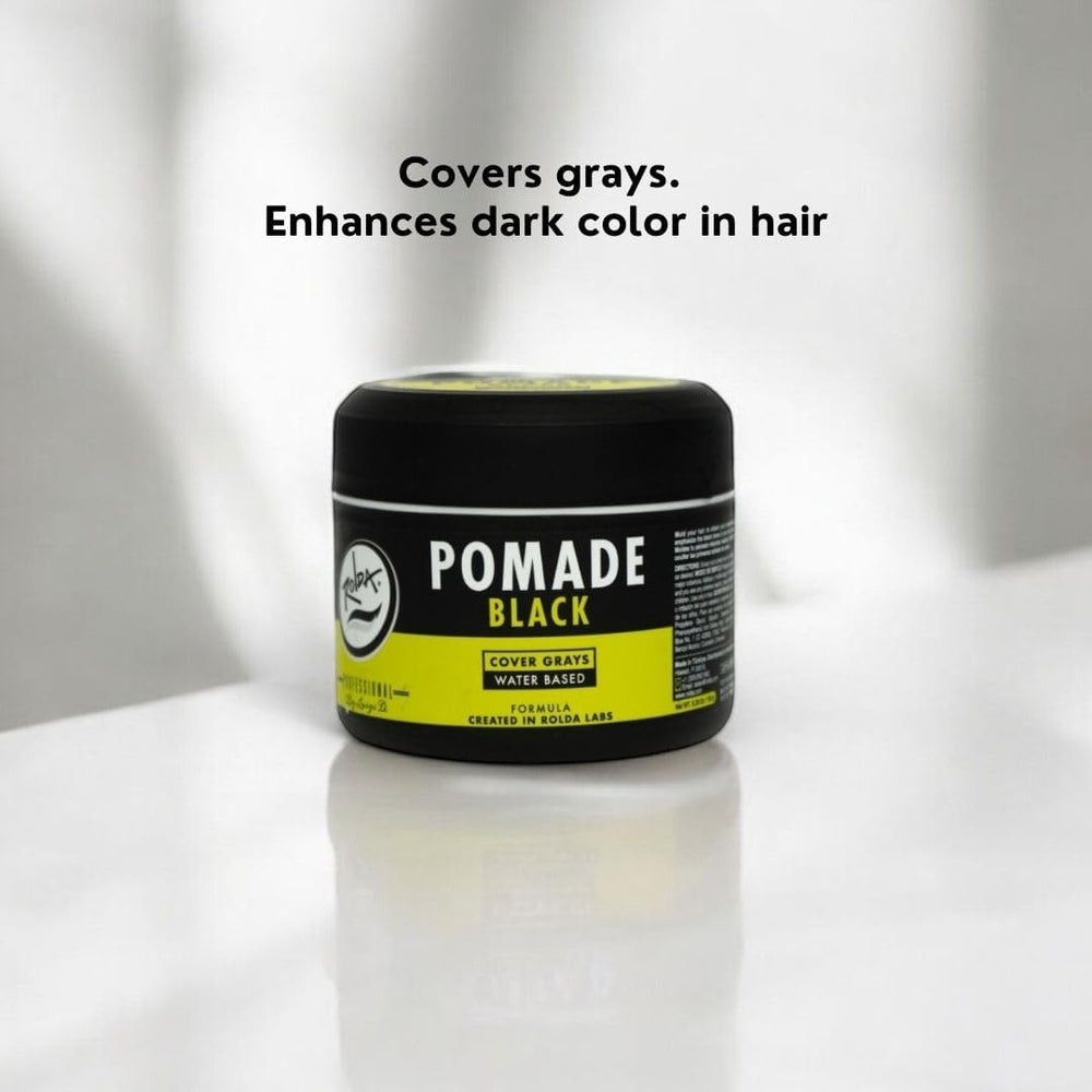 Rolda Black Pomade packaging display signals masculine grooming routine.