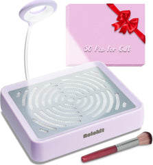 Rolokit nail dust collector with lamp demonstrates integrated lighting and suction for precise manicures.