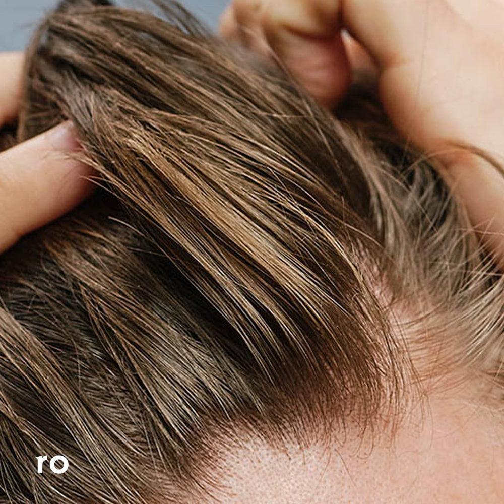 ROMAN image highlights sulfate- and paraben-free formula suitable for daily use.