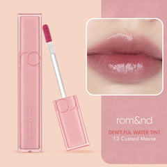 rom&nd DEWY·FUL Water Tint swatch on lips shows dewy finish and sheer layering.