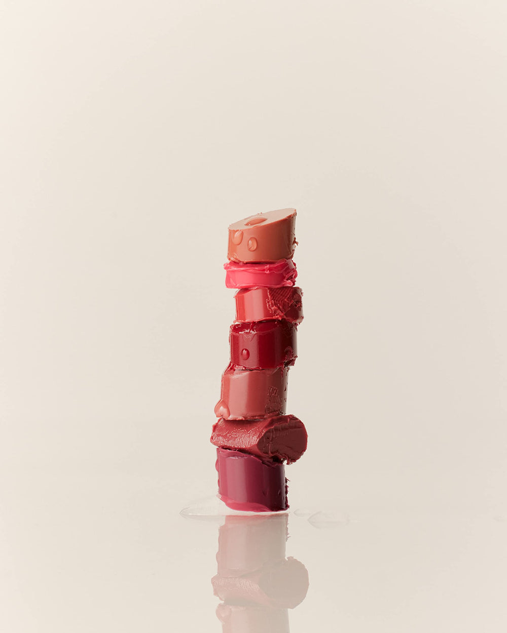 rom&nd Glasting Melting Balm Kaya Fig swirl on lips shows color payoff.