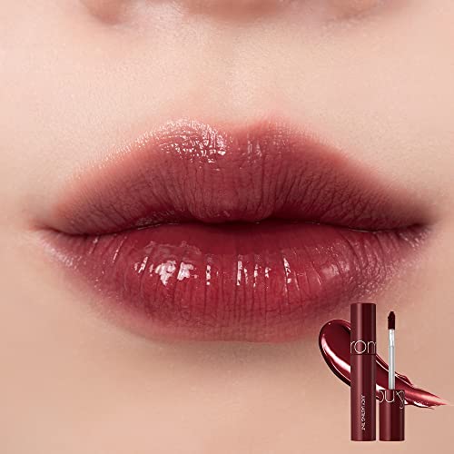 rom&nd Juicy Lasting Tint Deep Sangria gloss bottle demonstrates high-shine, non-sticky wear.