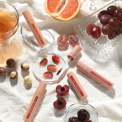 rom&nd Juicy Lasting Tint glossy finish closeup highlights smooth, moisturizing texture.