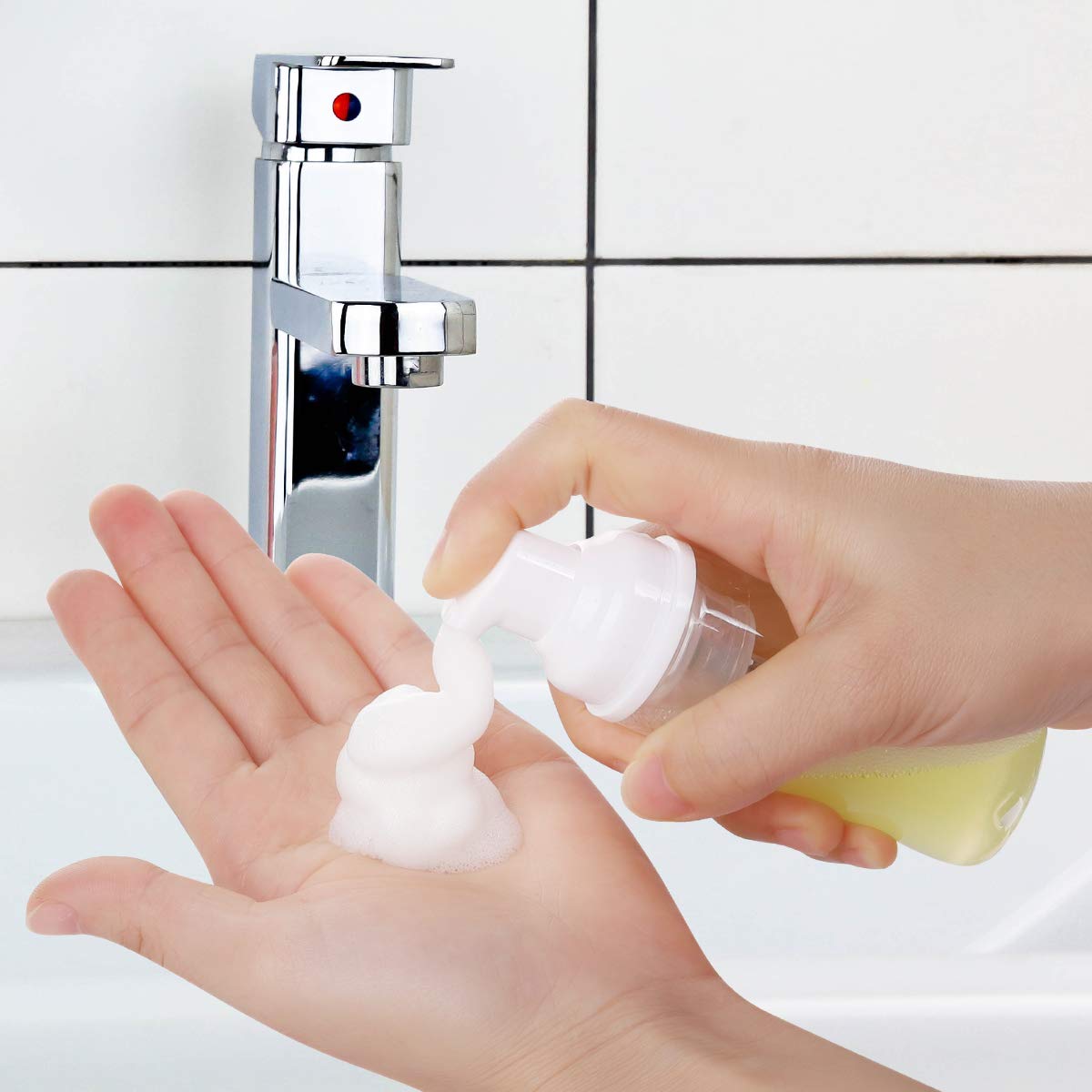 ROMROC foam bottle refillable body emphasizes sustainability with reusable 2oz containers.
