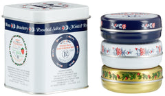 Rosebud Three Lavish Layers Lip Balm closeup shows creamy texture for lasting moisture.
