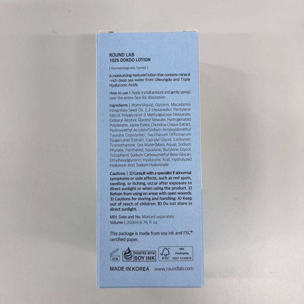 ROUND LAB 1025 Dokdo Lotion closeup of fluid on skin suggests immediate comfortable hydration