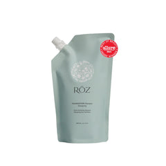 RŌZ Foundation Shampoo refill bottle pour demonstrates easy, waste-reducing daily cleansing.