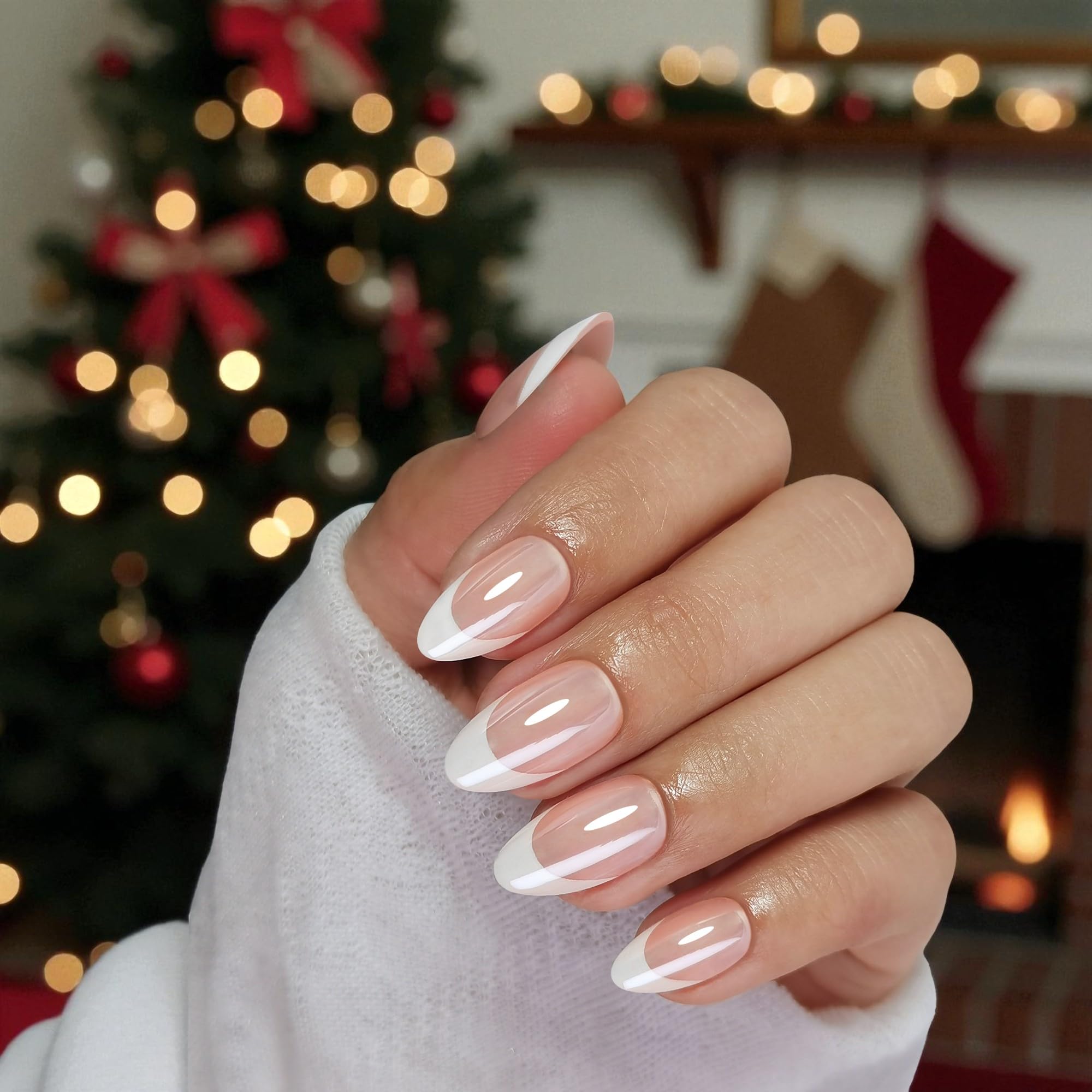 RPNZL Paris nails with French tip almond shape and UV finish for a salon look at home.
