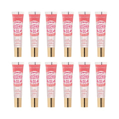Ruby Kisses Broadway Vita-Lip gloss bottle closeup showing rosehip oil for nourished lips