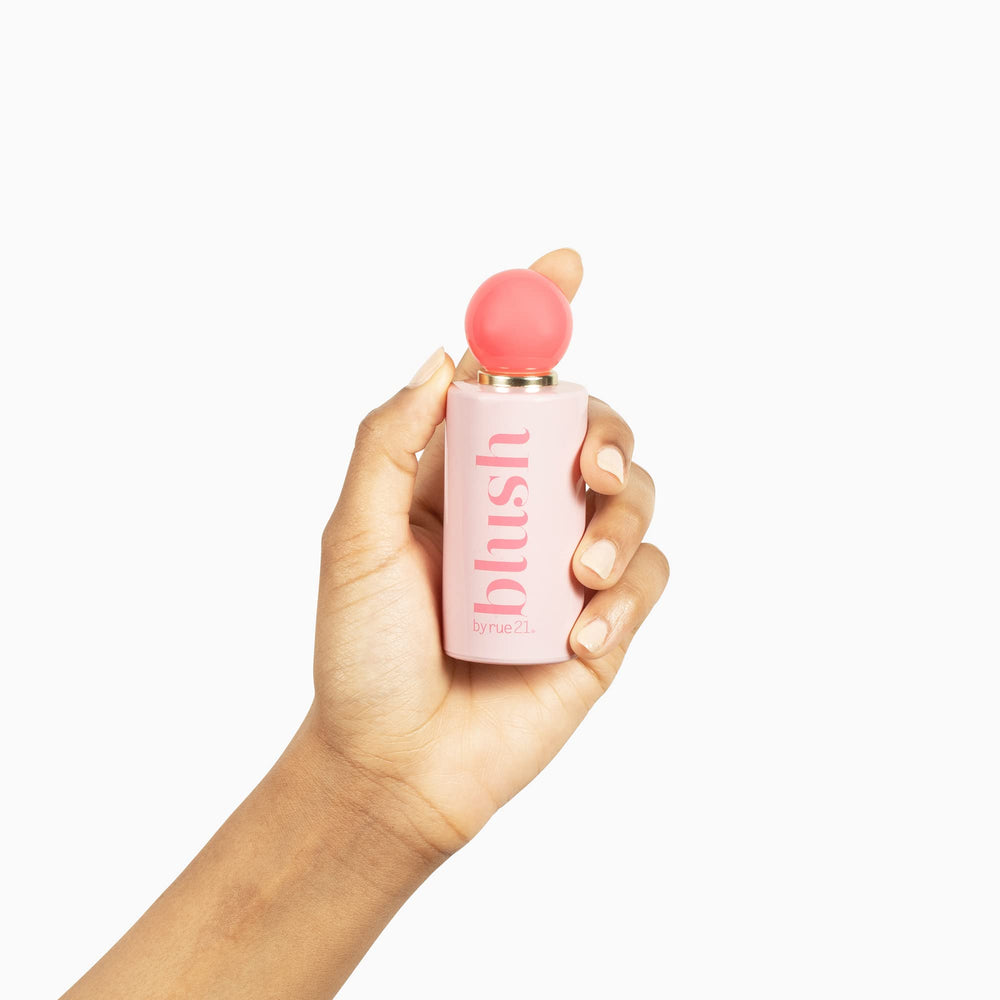 Rue 21 Blush Eau De Parfum spray mist dispersion for subtle fragrance release.