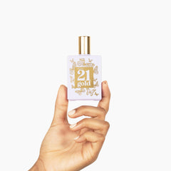 Rue 21 Gold packaging shines on a vanity shelf